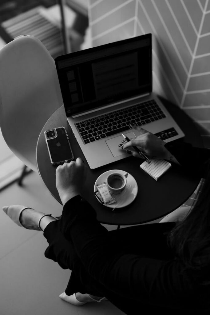 Digital marketing agency in Surat working on SEO and digital marketing services strategy using laptop, smartphone, and workspace setup.